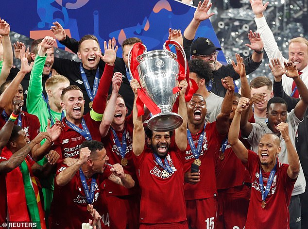 14246948-7094761-Liverpool_forward_Mohamed_Salah_lifts_the_Champions_League_troph-a-8_1559428843954